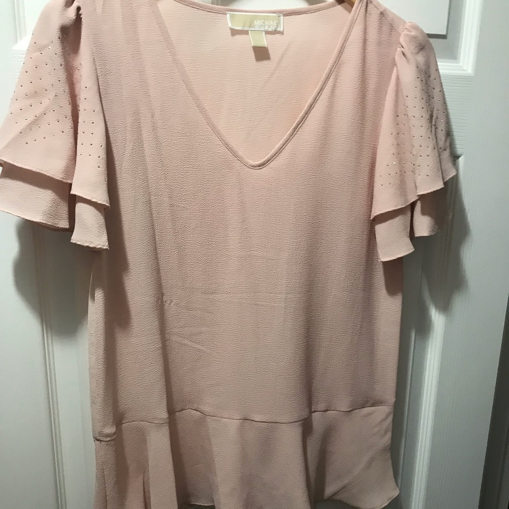 Soft pink blouse, tag removed but never worn.